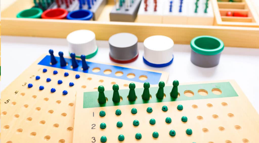 A picture of the racks and tubes material for division. These materials are an important part of the Montessori prepared environment.