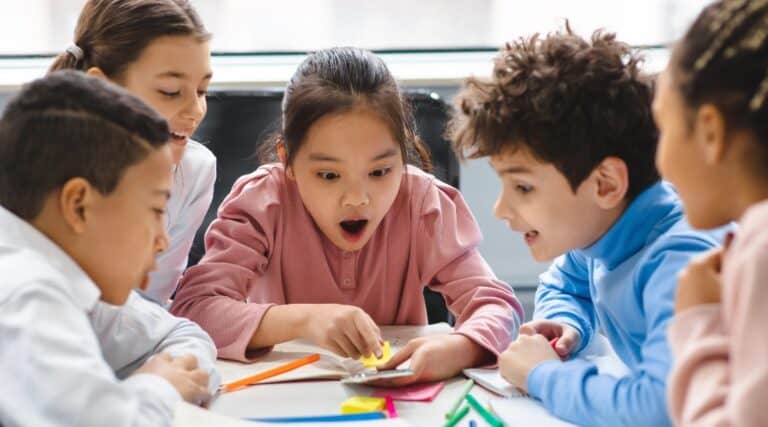 Students working together in one of their favorite grammar games.