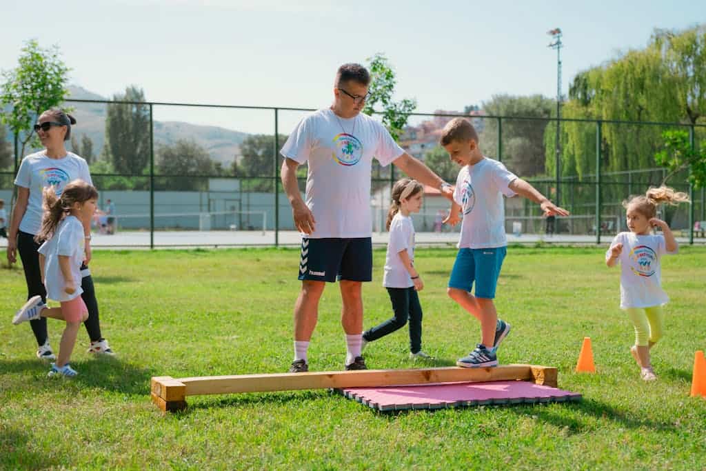 Schoolboy on a Simple Obstacle Course during a parts of speech activity at school.