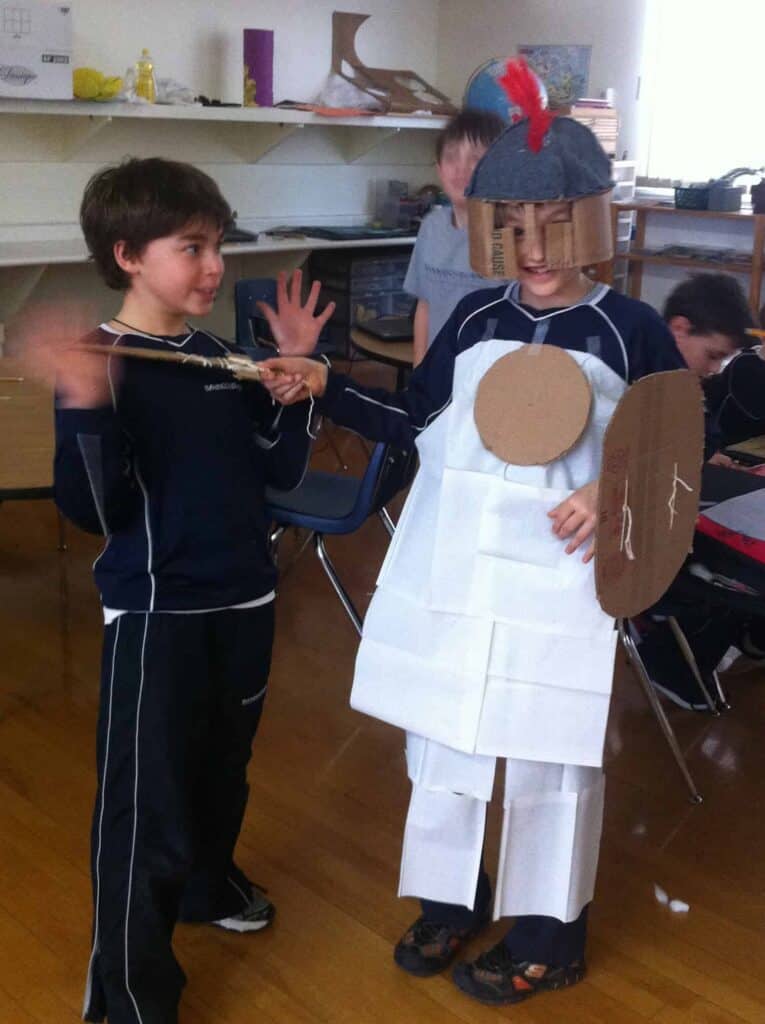 A picture from my upper elementary classroom of grad 4 boys working on a Medieval Times project.